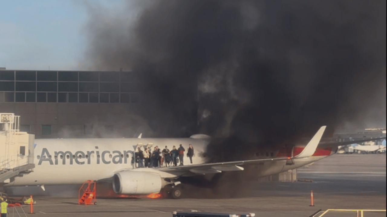 Aircraft evacuates American Airlines passengers after a fire at Denver Airport (Video) Aircraft evacuates American Airlines passengers after a fire at Denver Airport (Video)